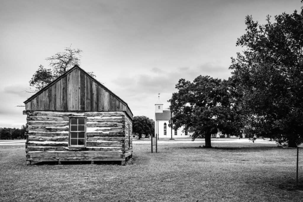 A black and white photo of the setting of old Wendish church in Texas