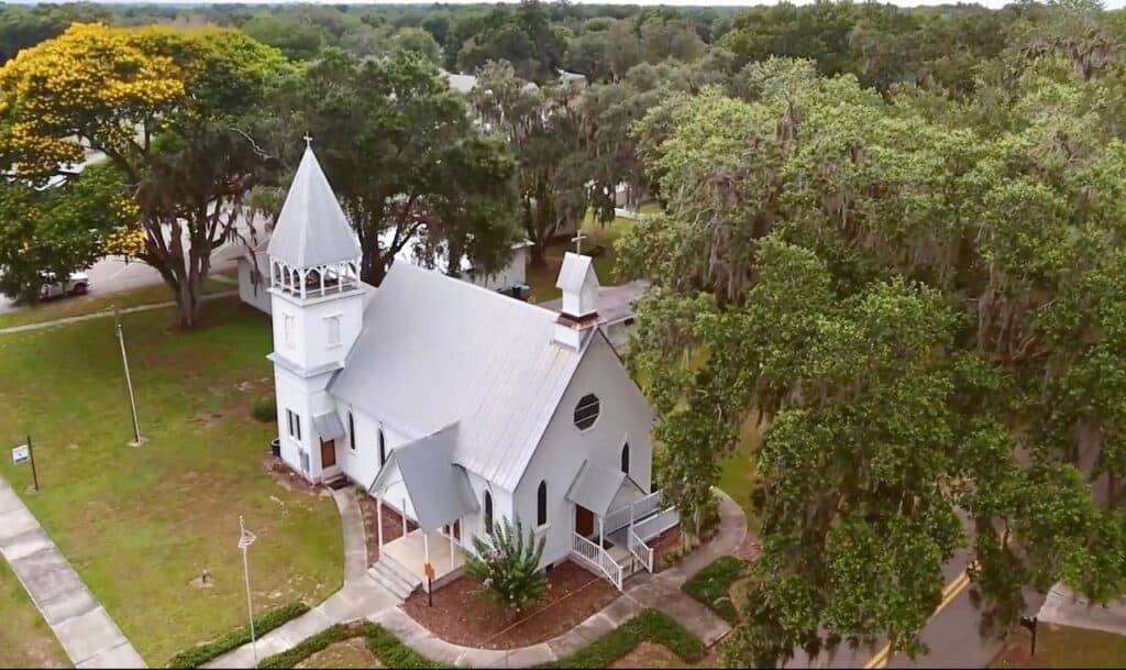 aerial view of a little white church