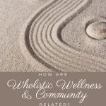 An image of stones in the sand - How Are Wholistic Wellness and Community Related