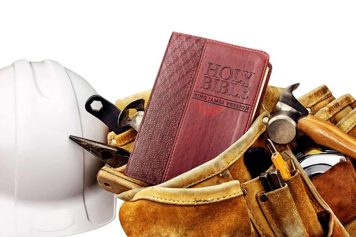 bible with construction tools